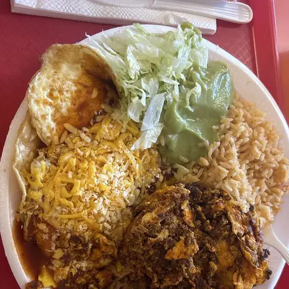 Mexican plate with rice beans chile relleno and meat